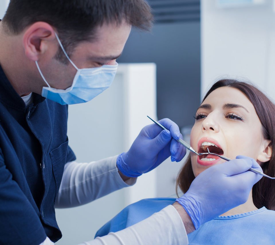 Dr. Maz Ebrahimi performing a root canal procedure in Beverly Hills